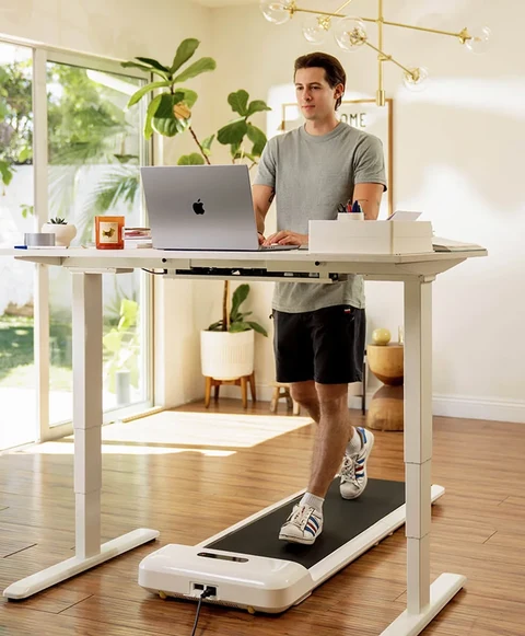 Movaped C2 walking pad used under standing desk for walking while working