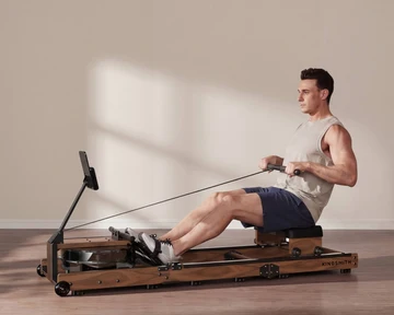 Man training on a Movaped water rowing machine for full body cardio exercise