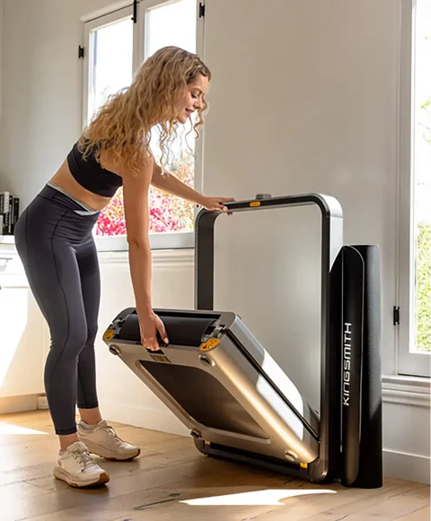 Vertical folding mechanism of the Movaped X21 treadmill for space saving storage
